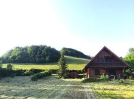 Kuća Snowdrop, brvnara s rustikalnim interijerom