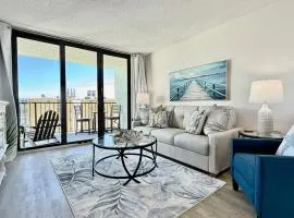 Top-floor ocean view condo with a private balcony and beachfront pool