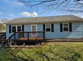 Blue Cottage with Game Room Deck & Hot Tub