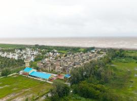 Lotus Lagoona Beach Resort, hotel i Surat