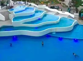 Family friendly modern flat in Caesar Resort &SPA, Long Beach İSKELE, KKTC