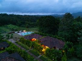 Clover Holiday Village Coorg Resort by VOYE HOMES, villa em Saniv&Auml;rsante