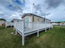 Caravan With Large Decking At Coopers Beach Holiday Park Ref 49012Sv