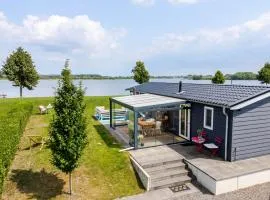 Strandperle Lathum Ferienhaus in Premium Lage am See für Urlaub und Workation mit Hundestrand