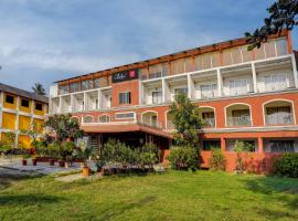 Collection O Martins Inn, hotel em Arnālapāda