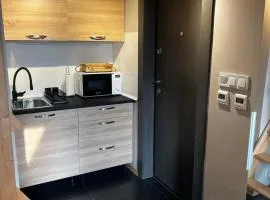 Cosy, workplace studio with a sunny rooftop view