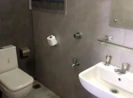 Affordable cozy room with attached washroom