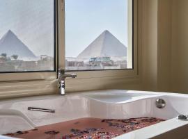Merak Pyramids Hotel, hotel con estacionamiento en El Cairo