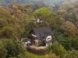 Nature Valley Farmhouse Resort by Raarees, Munnar #lap of nature #premium rooms #parking #Scenic view #garden with fireplace #property of the year