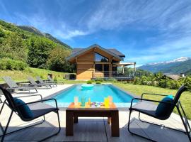 Chalet neuf, Jacuzzi, piscine privée mai-sept, pétanque, proche Paradiski, Hotel in Aime La Plagne