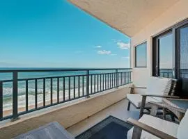Stunning direct oceanfront condo with a balcony, hot tub, and heated pool