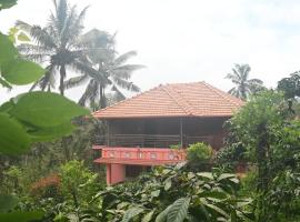 Dishaa Home Stay, ξενοδοχείο σε Madikeri
