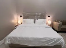 شقة أنيقة غرفة نوم وصالة الفيحاء