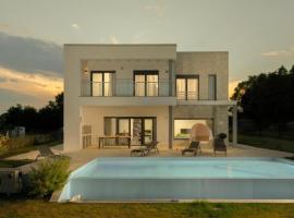Villa Monte DOr for 8 people with private pool and sea view, Hotel in Krnica