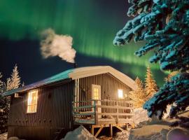 Koselig eldre hytte, hotel en Hammerfest