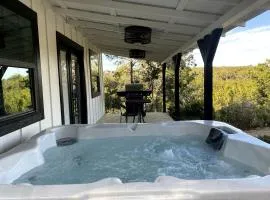 The Ultimate Romantic Getaway: Charming Cabin with a Hot Tub in Wimberley, Texas