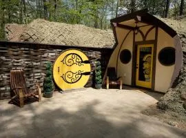 Charming Luxury Hobbit House with Private Hot Tub in Tranquil Woodlands on Littlefield Pond in Springvale, Maine