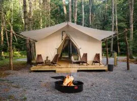 Luxury Group Safari Tent Complete with Firepit and Patio, Perfect for a Weekend Escape to the Adirondacks