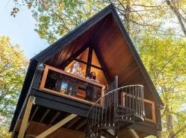 Eco-Friendly Solar Powered A-Frame Treehouse with Hot Tub and Private Dock on Littlefield Pond, near Wells, Maine