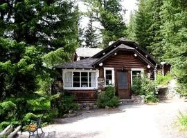 Rustic Family Cabin Nestled Among the Towering Trees in Idaho