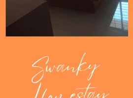 Swanky Midtown Holiday Inn 2BHK