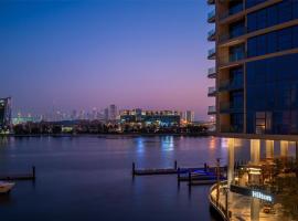 Hilton Dubai Creek Hotel & Residences, hotel en Dubái