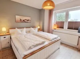Ferienwohnung "Achtern Diek 1" 1 Reihe an der Ostseeküste