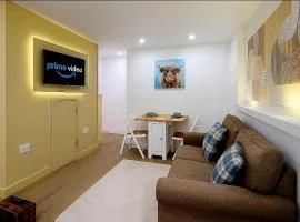 Modern Comforts – 4 Bedroom Home for Work & Play