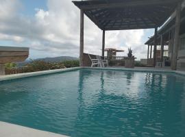 Breezy Castle Villa with private pool overlooking the Sea and Blue Mountains, villa in Port Maria