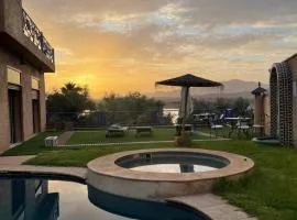 Dar NFis Suites et chambres de luxe dans un havre de paix vue paradisiaque au bord du lac