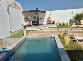 Dar Dalloula maison de vacances espace detente, hotel en Shanīnī