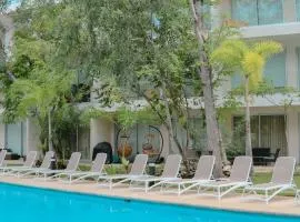 Stylish Playacar Condo with Balcony & Pool