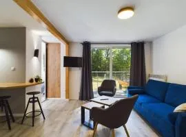 Apartamenty Dabrowka Plus - w lesie, prywatny parking, sauna, park