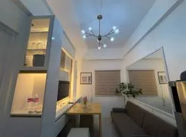 Near Mactan International airport Condo with Private Entrance and Shared Pool