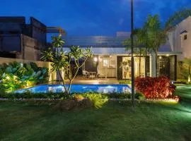 The Green Haven by StayJade2BHKACPoolLawn