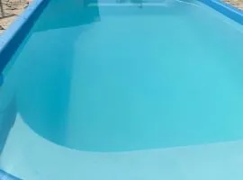 Casa ampla a 100 passos do mar, piscina, churrasqueira, salão de jogos