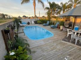 Casa ampla com área gourmet e piscina，位于卡庞达卡诺阿的酒店