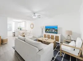 Boca Waterfront Oasis Walk to Beach with Pool, Hot Tub, Gym