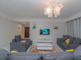 Spacious 2 Bedroom 5 minutes from JKIA Jomo Kenyatta International Airport, hotel with pools in Syokimau