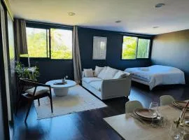 Logement dans un cadre verdoyant