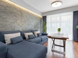 Elegant Blue Apartment in Gdańsk with Parking & Garden by Noclegi Renters