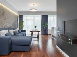 Elegant Blue Apartment in Gdańsk with Parking & Garden by Noclegi Renters