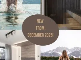 Aparthotel Familiaris - Family Apartments - Pools & Spa in Dolomites