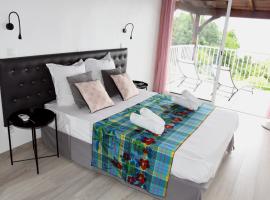 Duplex Rose Porcelaine - Vue Mer- Malendure, hotel di Bouillante
