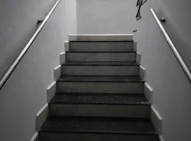 H M G service apartment
