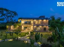 StayVista at The Tilah with Pool, Lawn, WiFi