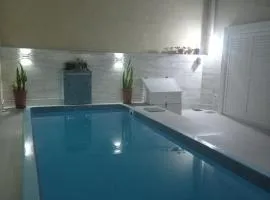 Sobrado aconchegante com Piscina Ar Condicionado 3 quartos a 150 metros do mar no Brejatuba