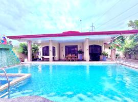 Villa de Flynn Private Resort, hotel met hottubs in Bauang