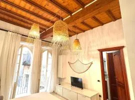 Kalma Via Manno - Central Stay with Stone Walls & Private Cinema