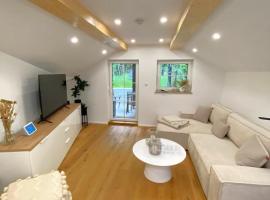 Alpenloft mit Garten & BBQ am Chiemsee by Dollop Living、ベルナウ・アム・キームゼーのホテル